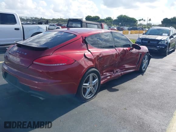 ✅ 2015 Porsche Panamera 4 • VIN: WP0AA2A73FL000977 • Lot: 42880623. Listed on IAAI with 74,709 mi. Free auction sales archive from the USA and detailed vehicle history report at DreamBid. Image 4.