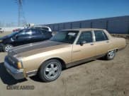 ✅ 1986 Pontiac Parisienne • VIN: 1G2BT69Y2GX267691 • Lot: 79337604. Listed on Copart with 55,458 mi. Free auction sales archive from the USA and detailed vehicle history report at DreamBid. Image 1.