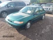 ✅ 1999 Ford Escort SE • VIN: 1FAFP13P2XW264113 • Lot: 42648045. Listed on IAAI with 72,253 mi. Free auction sales archive from the USA and detailed vehicle history report at DreamBid. Image 2.