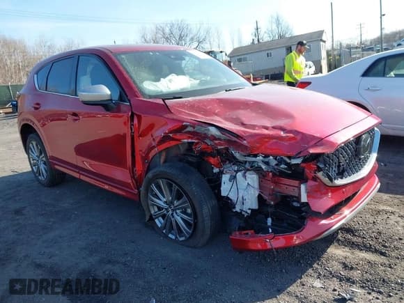 ✅ 2024 Mazda CX-5 Signature • VIN: JM3KFBXY1R0353821 • Lot: 41773620. Listed on IAAI with 21,889 mi. Free auction sales archive from the USA and detailed vehicle history report at DreamBid. Image 1.