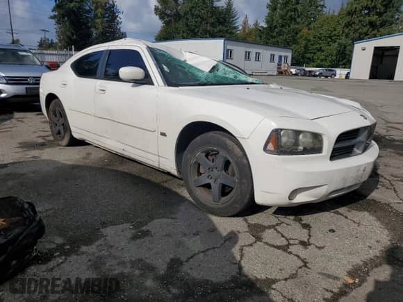 ✅ 2010 Dodge Charger SXT • VIN: 2B3CA3CV0AH155875 • Lot: 87068775. Listed on Copart with 220,120 mi. Free auction sales archive from the USA and detailed vehicle history report at DreamBid. Image 4.