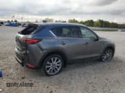 ✅ 2021 Mazda CX-5 Grand Touring • VIN: JM3KFBDM5M0455018 • Lot: 83847965. Wystawiony na Copart z przebiegiem 10 530 mil. Bezpłatny archiwum sprzedaży aukcyjnych z USA i szczegółowy raport historii pojazdu na DreamBid. Zdjęcie 3.