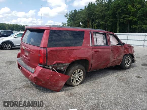 2015 Chevrolet Suburban LT с VIN 1GNSCJKC0FR158945, выставлен на аукционе Copart как лот 72095874 с пробегом 283 160 миль миль и Списание • Salvage title. История ставок и продаж доступна на DreamBid. Изображение 3.