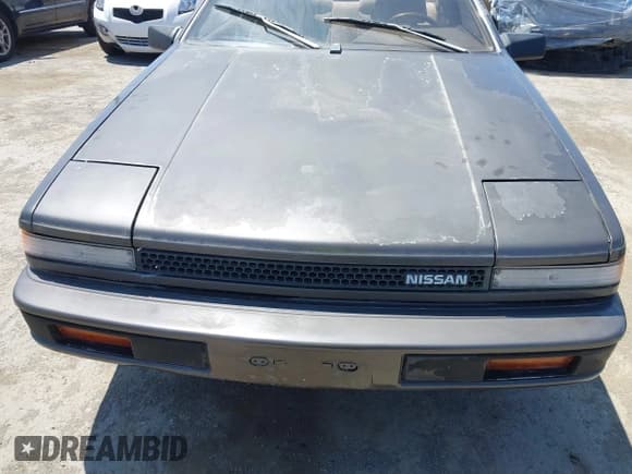 ✅ 1986 Nissan 200SX • VIN: JN1PS24S7GW112725 • Лот: 42533555. Опубликован ранее на IAAI с пробегом 74 240 миль. Бесплатный доступ к архиву аукционных продаж из США и подробный отчёт об истории автомобиля на DreamBid. Изображение 6.