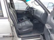 ✅ 2004 Ford Explorer Sport Trac XLS • VIN: 1FMZU77K34UA65740 • Lot: 43589534. Listed on IAAI with 310,281 mi. Free auction sales archive from the USA and detailed vehicle history report at DreamBid. Image 5.