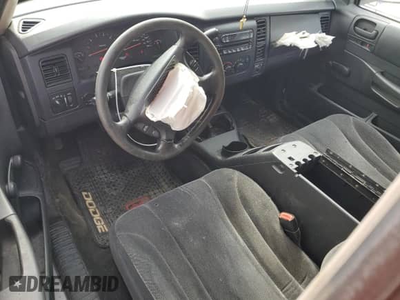 2004 Dodge Dakota с VIN 1D7GL12K24S653634, выставлен на аукционе Copart как лот 74799854 с пробегом 183 971 миль миль и Списание • Salvage title. История ставок и продаж доступна на DreamBid. Изображение 8.