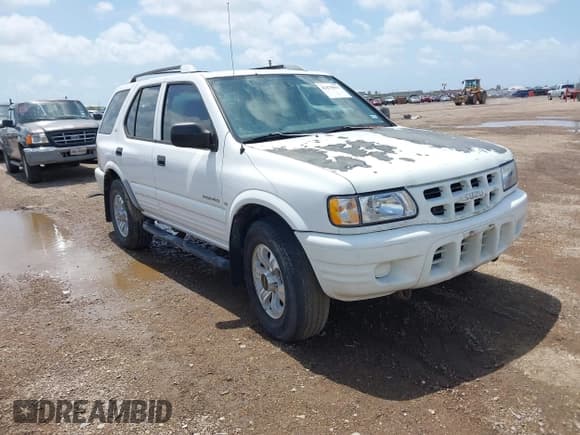 ✅ 2001 Isuzu Rodeo S • VIN: 4S2CK58W414357404 • Lot: 42479053. Listed on IAAI with Not provided. Free auction sales archive from the USA and detailed vehicle history report at DreamBid. Image 1.