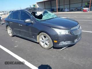 2014 Chevrolet Cruze 2LT with VIN 1G1PE5SB3E7269399, listed as a IAAI auction lot 43305556 with 139,689 mi miles and . Bid and sale history available at DreamBid. Image 1.