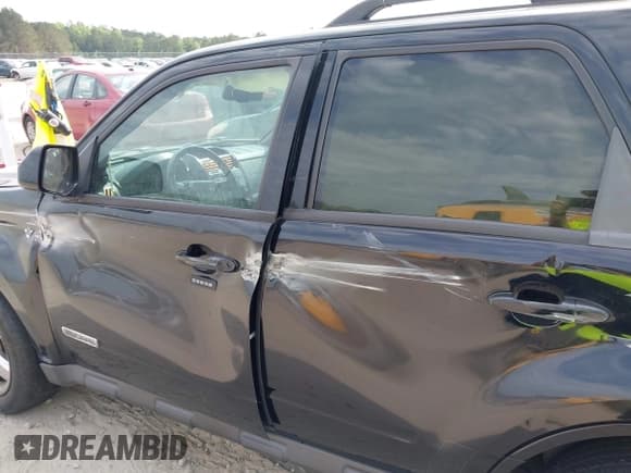 ✅ 2008 Ford Escape Limited • VIN: 1FMCU04178KE77007 • Lot: 42078654. Listed on IAAI with 233,168 mi. Free auction sales archive from the USA and detailed vehicle history report at DreamBid. Image 14.