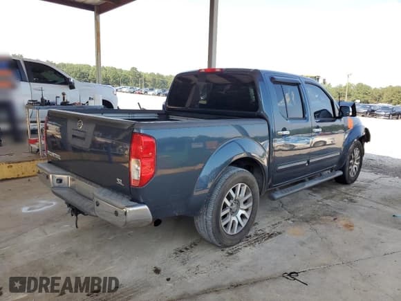 ✅ 2013 Nissan Frontier SL • VIN: 1N6AD0ER2DN712919 • Lot: 62019235. Listed on Copart with 242,539 mi. Free auction sales archive from the USA and detailed vehicle history report at DreamBid. Image 3.