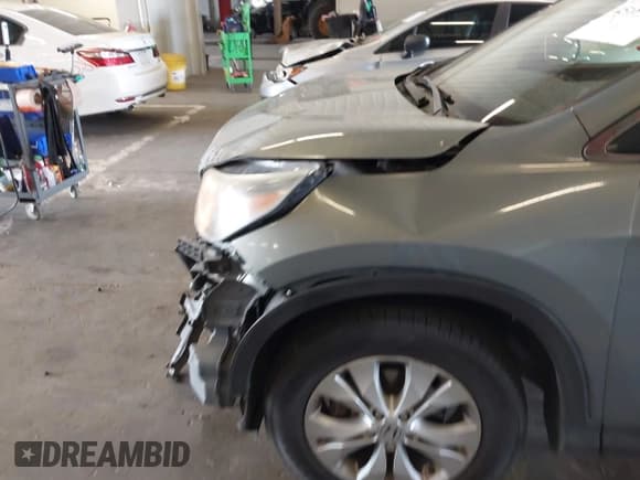 ✅ 2012 Honda CR-V EX-L • VIN: JHLRM4H76CC014740 • Lot: 43184641. Listed on IAAI with 124,452 mi. Free auction sales archive from the USA and detailed vehicle history report at DreamBid. Image 6.