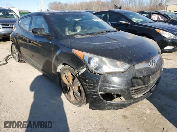 2012 Hyundai Veloster w/Red Int z VIN KMHTC6AD5CU030242, wystawiony jako Copart lot #83016604 z przebiegiem 142 555 mil mil oraz Szkoda całkowita • Salvage title. Historia ofert i sprzedaży dostępna na DreamBid. Obrazek 4.