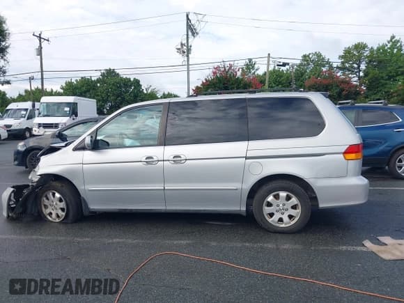 ✅ 2003 Honda Odyssey EX-L • VIN: 5FNRL18003B132156 • Lot: 42987337. Wystawiony na IAAI z przebiegiem 259 156 mil. Bezpłatny archiwum sprzedaży aukcyjnych z USA i szczegółowy raport historii pojazdu na DreamBid. Zdjęcie 14.