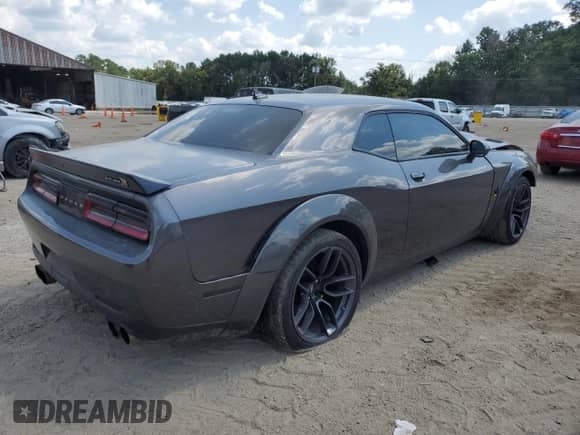 ✅ 2021 Dodge Challenger R/T Scat Pack Widebody • VIN: 2C3CDZFJXMH664561 • Lot: 71657455. Listed on Copart with 44,934 mi. Free auction sales archive from the USA and detailed vehicle history report at DreamBid. Image 3.
