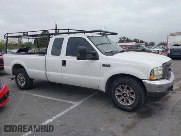 ✅ 2004 Ford F-250 XL • VIN: 1FTNX20L84EA02255 • Лот: 42034960. Опубликован ранее на IAAI с пробегом 70 590 миль. Бесплатный доступ к архиву аукционных продаж из США и подробный отчёт об истории автомобиля на DreamBid. Изображение 13.