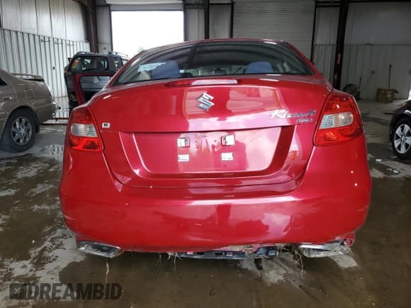✅ 2012 Suzuki Kizashi SE • VIN: JS2RF9A3XC6100603 • Лот: 62705995. Опубликован ранее на Copart с пробегом 186 317 миль. Бесплатный доступ к архиву аукционных продаж из США и подробный отчёт об истории автомобиля на DreamBid. Изображение 6.