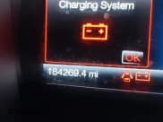 ✅ 2014 Ford Taurus SEL • VIN: 1FAHP2E81EG117230 • Lot: 43522256. Listed on IAAI with 184,269 mi. Free auction sales archive from the USA and detailed vehicle history report at DreamBid. Image 15.