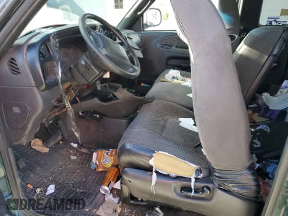 2001 Dodge 1500 с VIN 1B7HF13ZX1J570732, выставлен на аукционе Copart как лот 84479494 с пробегом Не указан миль и Списание • Salvage title. История ставок и продаж доступна на DreamBid. Изображение 7.