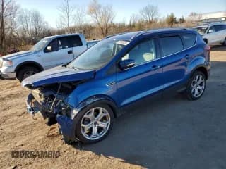 ✅ 2019 Ford Escape Titanium • VIN: 1FMCU9J92KUA03489 • Лот: 92955435. Опубликован ранее на Copart с пробегом 92 523 миль. Бесплатный доступ к архиву аукционных продаж из США и подробный отчёт об истории автомобиля на DreamBid. Изображение 1.