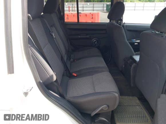 ✅ 2010 Jeep Commander Sport • VIN: 1J4RH4GK4AC140982 • Lot: 42344821. Listed on IAAI with 179,476 mi. Free auction sales archive from the USA and detailed vehicle history report at DreamBid. Image 8.