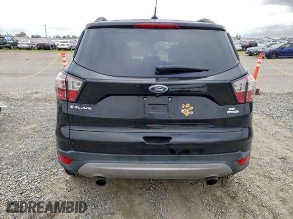 ✅ 2018 Ford Escape SE • VIN: 1FMCU0GD0JUC36969 • Lot: 94981265. Listed on Copart with 127,764 mi. Free auction sales archive from the USA and detailed vehicle history report at DreamBid. Image 6.