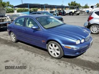 ✅ 2004 Jaguar X-Type • VIN: SAJEA51C74WD75027 • Lot: 67503694. Listed on Copart with 92,796 mi. Free auction sales archive from the USA and detailed vehicle history report at DreamBid. Image 4.