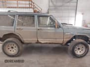 ✅ 1998 Jeep Cherokee Sport • VIN: 1J4FJ68S5WL284937 • Lot: 41984490. Listed on IAAI with 259,716 mi. Free auction sales archive from the USA and detailed vehicle history report at DreamBid. Image 14.