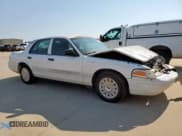 ✅ 2005 Ford Crown Victoria Standard • VIN: 2FAFP73W85X115541 • Lot: 70382085. Listed on Copart with 184,362 mi. Free auction sales archive from the USA and detailed vehicle history report at DreamBid. Image 4.