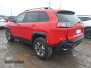 ✅ 2019 Jeep Cherokee Trailhawk • VIN: 1C4PJMBX4KD121168 • Lot: 41680398. Listed on IAAI with 128,931 mi. Free auction sales archive from the USA and detailed vehicle history report at DreamBid. Image 3.
