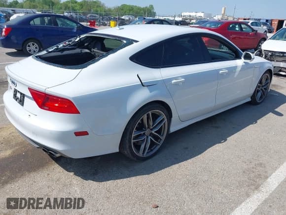 ✅ 2015 Audi S7 • VIN: WAUW2AFC1FN016325 • Lot: 42112895. Listed on IAAI with 120,356 mi. Free auction sales archive from the USA and detailed vehicle history report at DreamBid. Image 4.