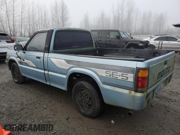 ✅ 1986 Mazda B-Series SE5 • VIN: JM2UF1111G0534949 • Лот: 87549665. Опубликован ранее на Copart с пробегом 201 064 миль. Бесплатный доступ к архиву аукционных продаж из США и подробный отчёт об истории автомобиля на DreamBid. Изображение 2.