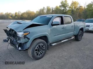 ✅ 2022 Toyota Tacoma TRD Off Road • VIN: 3TYDZ5BN8NT007185 • Лот: 85504595. Опубликован ранее на Copart с пробегом 70 950 миль. Бесплатный доступ к архиву аукционных продаж из США и подробный отчёт об истории автомобиля на DreamBid. Изображение 1.