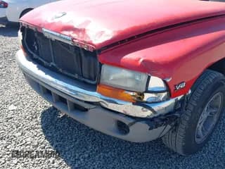 ✅ 1998 Dodge Dakota SLT • VIN: 1B7GL22Y9WS515290 • Lot: 42817601. Wystawiony na IAAI z przebiegiem 169 099 mil. Bezpłatny archiwum sprzedaży aukcyjnych z USA i szczegółowy raport historii pojazdu na DreamBid. Zdjęcie 6.