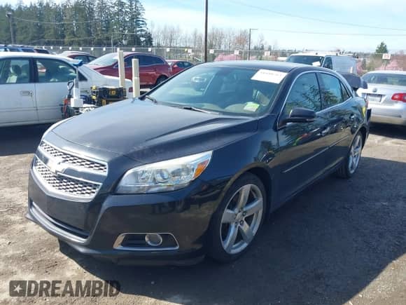 2013 Chevrolet Malibu LTZ with VIN 1G11J5SXXDF304697, listed as a IAAI auction lot 41880763 with 96,220 mi miles and . Bid and sale history available at DreamBid. Image 2.
