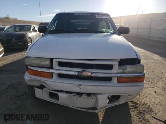 2003 Chevrolet Blazer LS z VIN 1GNDT13X33K136937, wystawiony jako Copart lot #80944284 z przebiegiem 163 549 mil mil oraz Szkoda całkowita • Salvage title. Historia ofert i sprzedaży dostępna na DreamBid. Obrazek 5.
