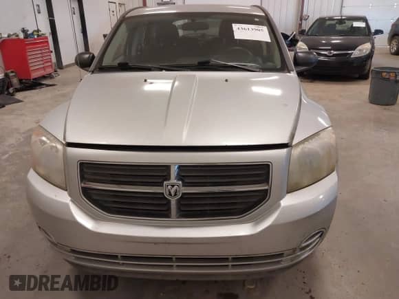 ✅ 2010 Dodge Caliber SXT • VIN: 1B3CB4HA7AD651925 • Лот: 43613905. Опубликован ранее на IAAI с пробегом 177 969 миль. Бесплатный доступ к архиву аукционных продаж из США и подробный отчёт об истории автомобиля на DreamBid. Изображение 6.