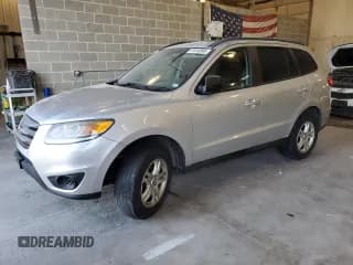 ✅ 2012 Hyundai Santa Fe GLS • VIN: 5XYZGDAB6CG165365 • Lot: 81910995. Listed on Copart with 212,536 mi. Free auction sales archive from the USA and detailed vehicle history report at DreamBid. Image 1.