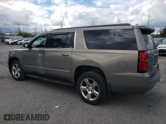 2018 Chevrolet Suburban LS z VIN 1GNSKGKC8JR396475, wystawiony jako Copart lot #75859654 z przebiegiem 67 080 mil mil oraz Szkoda całkowita • Salvage title. Historia ofert i sprzedaży dostępna na DreamBid. Obrazek 2.