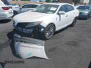 ✅ 2015 Lincoln MKS • VIN: 1LNHL9DK0FG608347 • Lot: 43066384. Listed on IAAI with 47,333 mi. Free auction sales archive from the USA and detailed vehicle history report at DreamBid. Image 18.