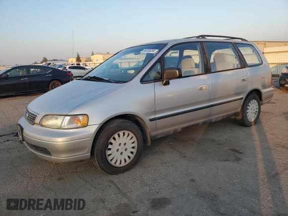✅ 1997 Honda Odyssey • VIN: JHMRA1842VC003732 • Lot: 86205204. Listed on Copart with 136,693 mi. Free auction sales archive from the USA and detailed vehicle history report at DreamBid. Image 1.