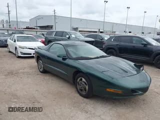 ✅ 1994 Pontiac Firebird Firebird • VIN: 2G2FS22S9R2217920 • Lot: 42153811. Listed on IAAI with 128,364 mi. Free auction sales archive from the USA and detailed vehicle history report at DreamBid. Image 1.