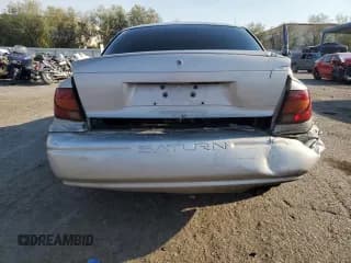 ✅ 2001 Saturn SL • VIN: 1G8ZH52871Z319001 • Лот: 71104574. Опубликован ранее на Copart с пробегом 258 955 миль. Бесплатный доступ к архиву аукционных продаж из США и подробный отчёт об истории автомобиля на DreamBid. Изображение 6.