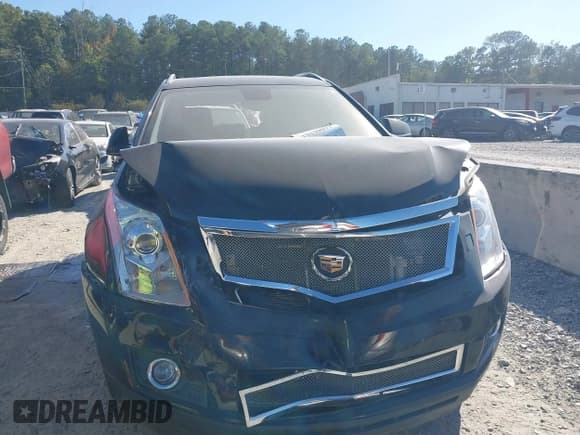 ✅ 2012 Cadillac SRX Premium Collection • VIN: 3GYFNCE34CS511833 • Lot: 43339091. Wystawiony na IAAI z przebiegiem 172 706 mil. Bezpłatny archiwum sprzedaży aukcyjnych z USA i szczegółowy raport historii pojazdu na DreamBid. Zdjęcie 12.