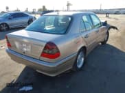 ✅ 2000 Mercedes-Benz C 230 Kompressor • VIN: WDBHA24G9YA856825 • Lot: 41418925. Wystawiony na IAAI z przebiegiem 99 616 mil. Bezpłatny archiwum sprzedaży aukcyjnych z USA i szczegółowy raport historii pojazdu na DreamBid. Zdjęcie 4.