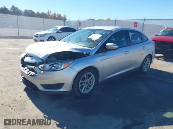 ✅ 2018 Ford Focus SE • VIN: 1FADP3FE7JL286226 • Lot: 43619631. Wystawiony na IAAI z przebiegiem 97 842 mil. Bezpłatny archiwum sprzedaży aukcyjnych z USA i szczegółowy raport historii pojazdu na DreamBid. Zdjęcie 17.