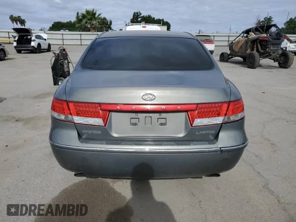 2006 Hyundai Azera SE с VIN KMHFC46F76A054625, выставлен на аукционе Copart как лот 56588315 с пробегом 178 667 миль миль и Списание • Salvage title. История ставок и продаж доступна на DreamBid. Изображение 6.