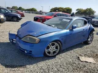 2004 Hyundai Tiburon GT с VIN KMHHN65F14U134711, выставлен на аукционе Copart как лот 62186845 с пробегом 186 632 миль миль и Списание • Salvage title. История ставок и продаж доступна на DreamBid. Изображение 1.