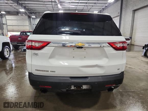 ✅ 2020 Chevrolet Traverse LT • VIN: 1GNEVHKW9LJ322665 • Lot: 81523295. Wystawiony na Copart z przebiegiem Nie podano. Bezpłatny archiwum sprzedaży aukcyjnych z USA i szczegółowy raport historii pojazdu na DreamBid. Zdjęcie 6.