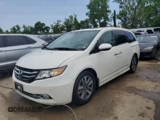 ✅ 2015 Honda Odyssey Touring Elite • VIN: 5FNRL5H98FB071942 • Lot: 57132464. Wystawiony na Copart z przebiegiem 148 015 mil. Bezpłatny archiwum sprzedaży aukcyjnych z USA i szczegółowy raport historii pojazdu na DreamBid. Zdjęcie 1.