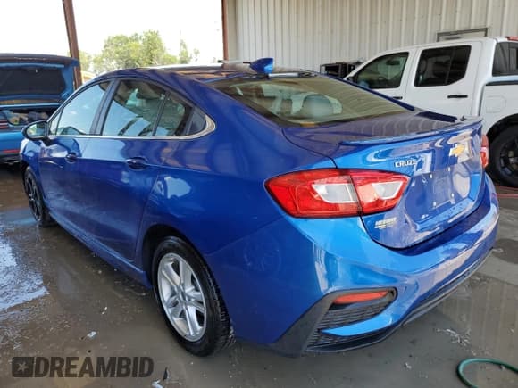 ✅ 2018 Chevrolet Cruze LT • VIN: 1G1BE5SM2J7156632 • Lot: 56020013. Listed on Copart with 78,095 mi. Free auction sales archive from the USA and detailed vehicle history report at DreamBid. Image 2.